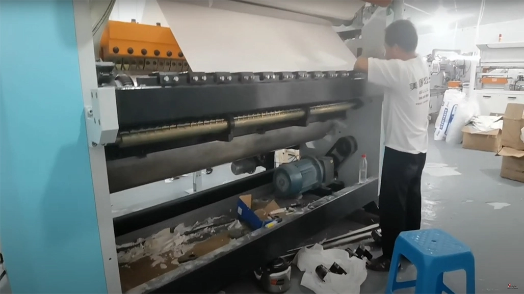 Paper Napkin Embossing Folding Machine Means a Machine Can Emboss While Fold the Tissue Paper